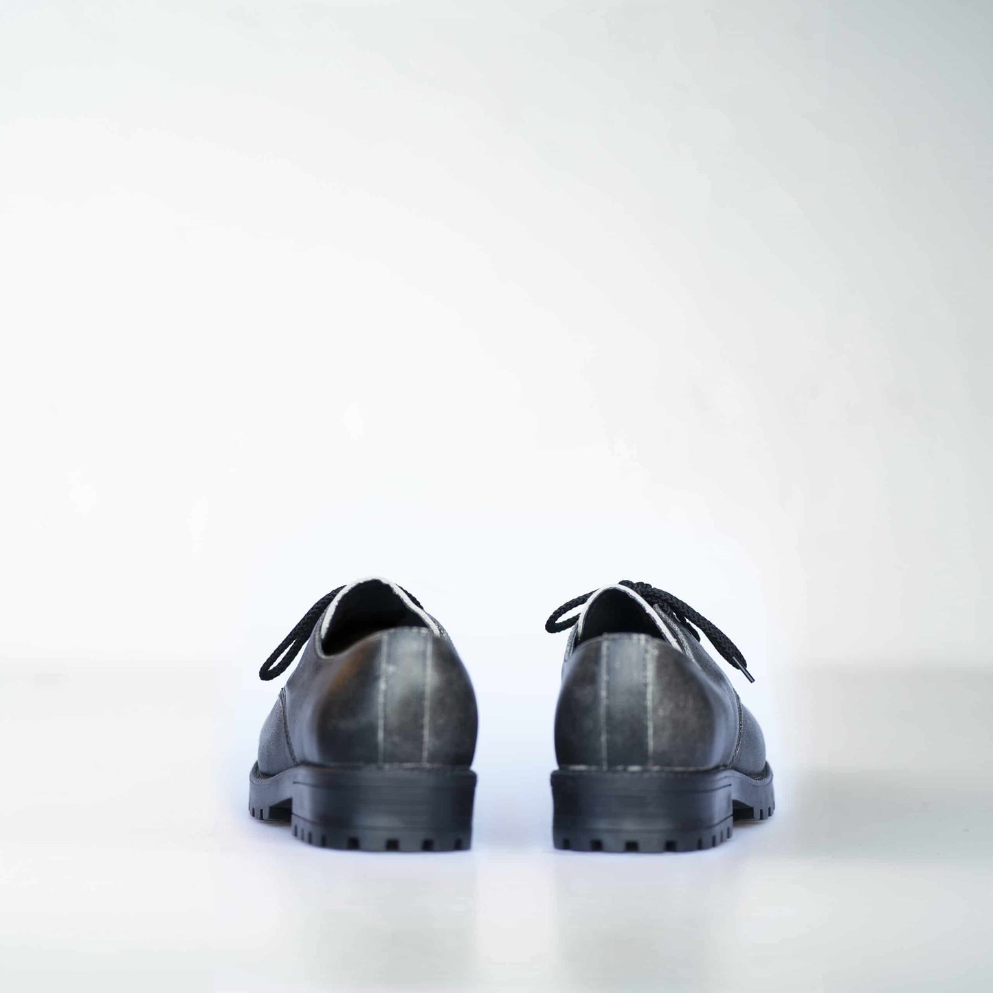 Military-grade black leather boots with antibacterial insole and direct-injected PU sole by Samelin.