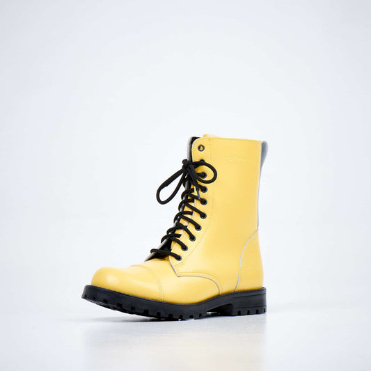 Yellow punk leather military boots by Samelin with water-repellent finish and durable rubber sole.