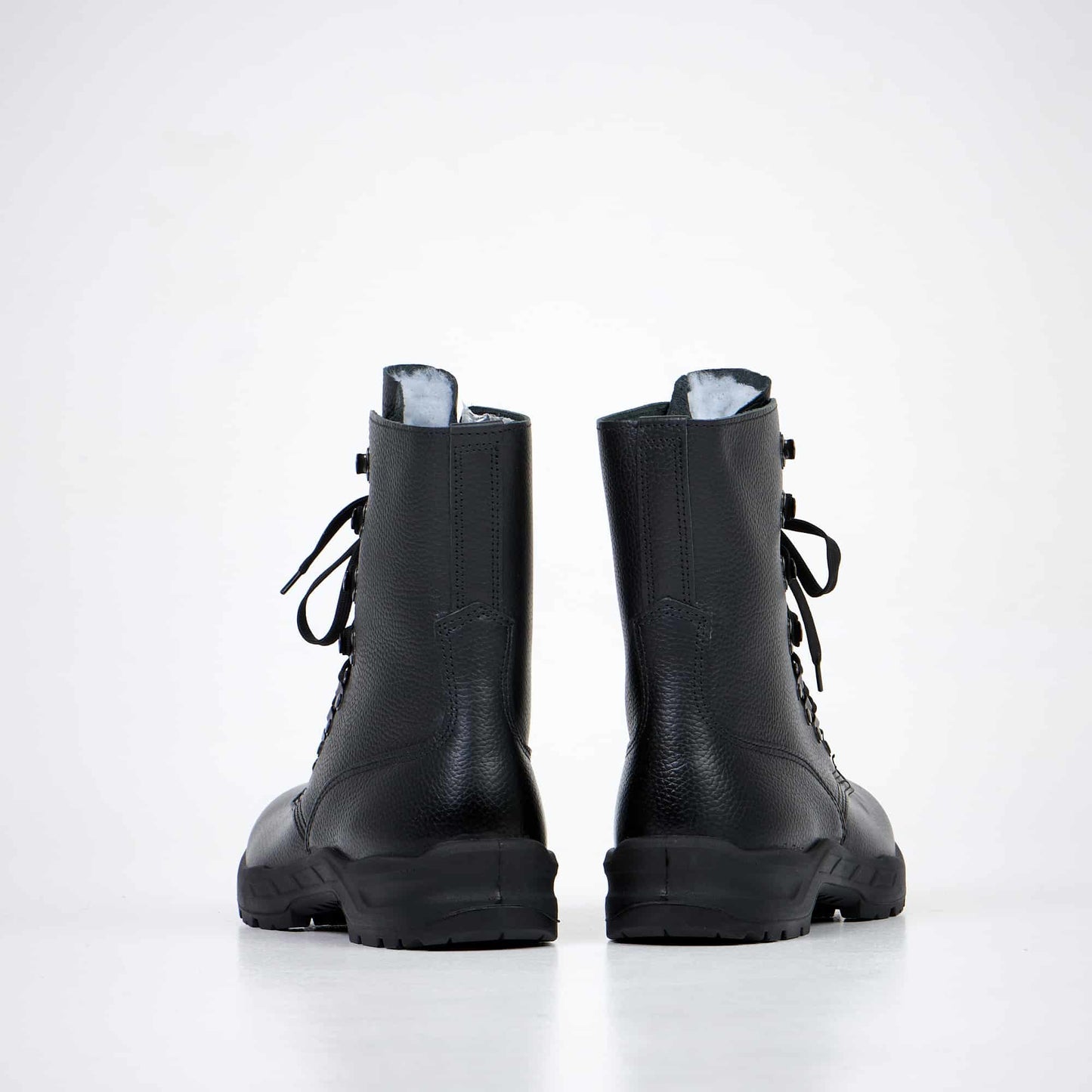 Black waterproof leather combat boots with lace-up closure, dual-layer sole, and anatomical insole by Samelin.