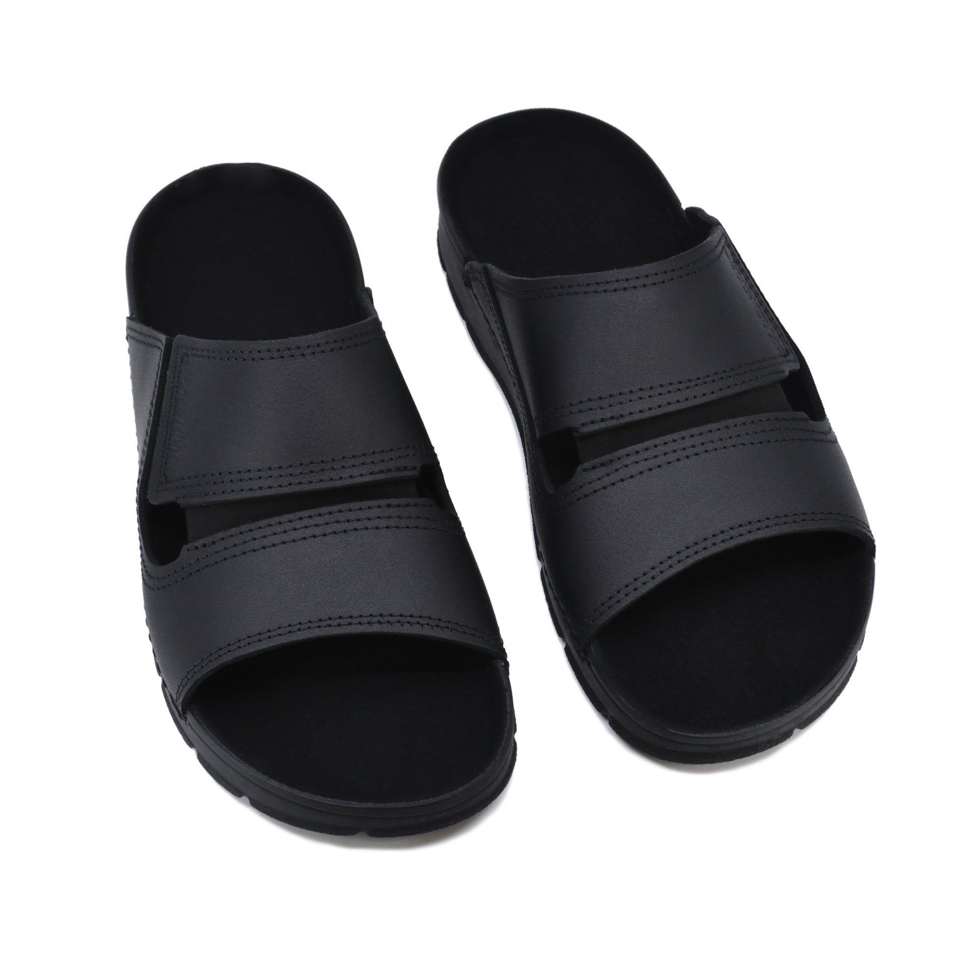 Black Miku sandals by Omaking with dual adjustable straps and cushioned footbed, available in sizes 39, 40, and 41.