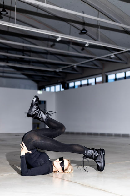 Black waterproof overboots with PU sole, artificial fur lining, and foldable design by Samelin. Available in sizes 37-42.