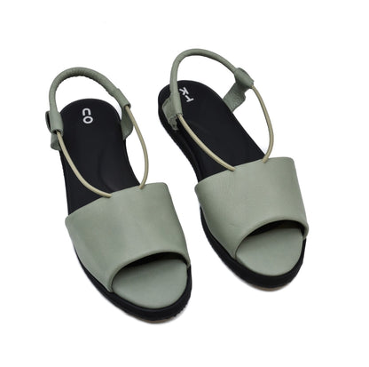 Green handmade leather sandals by TOKU with open toe and ergonomic EVA sole, available in sizes 36-38.