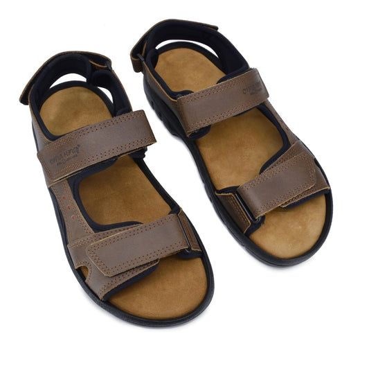 Brown leather sandals with adjustable straps, cushioned footbed, by Omaking, available in sizes 41, 42, and 43.