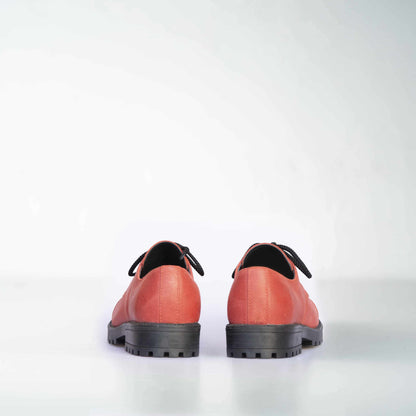 Red genuine leather military-grade boots with antibacterial features, unisex design by Samelin.