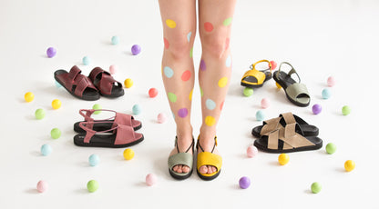 Yellow leather sandals by TOKU with ergonomic design, featuring adjustable straps and EVA sole
