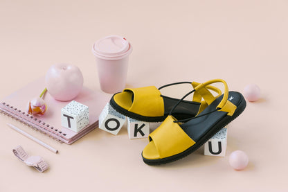 Yellow handmade leather sandals by TOKU with ergonomic design and EVA sole