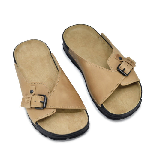 Beige leather sandals with adjustable buckle strap and cushioned footbed by Omaking, available in sizes 36-38.