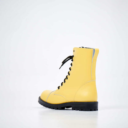 Yellow punk leather military boots with water-repellent finish and black rubber sole by Samelin