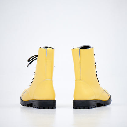Yellow punk leather military boots with water-repellent finish, lace-up design, and durable sole by Samelin.