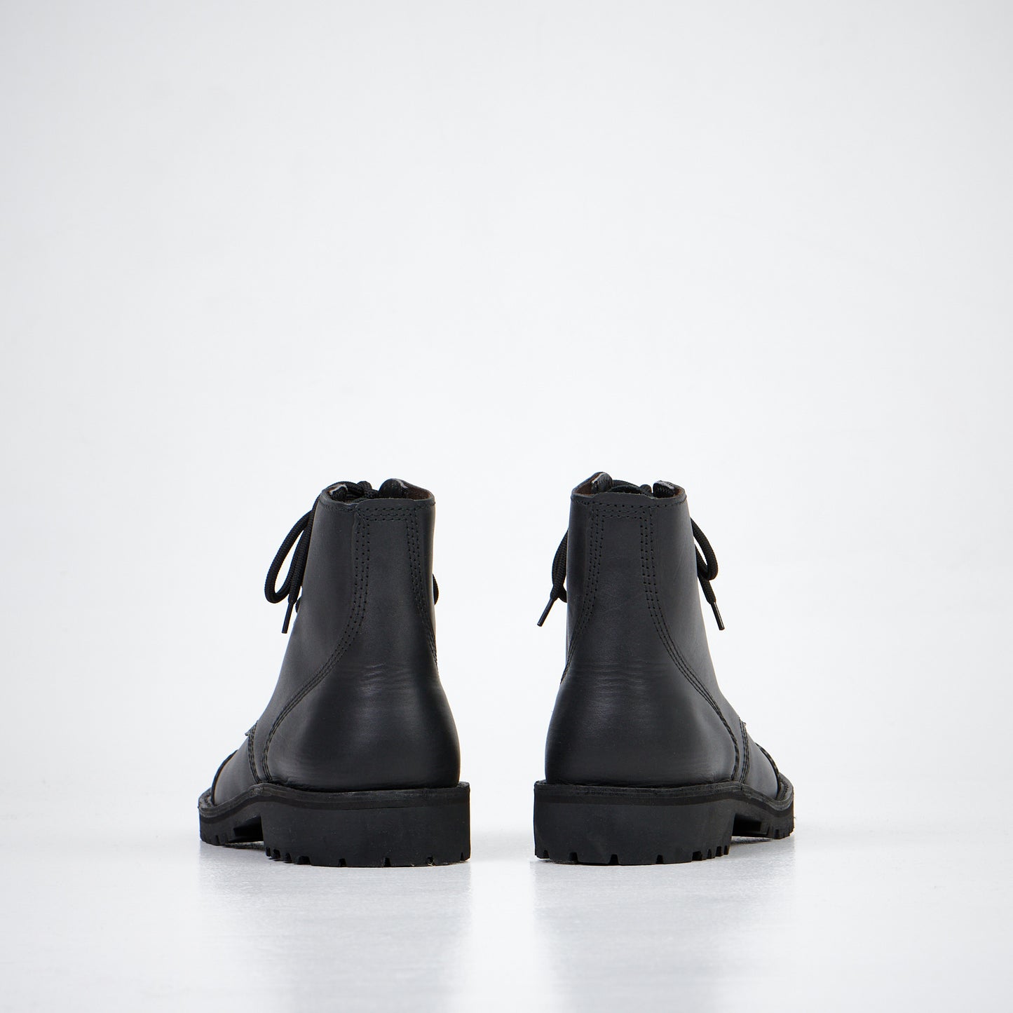 Black leather ankle boots with lace-up design, available in sizes 40, 41, and 42 by AIPI.