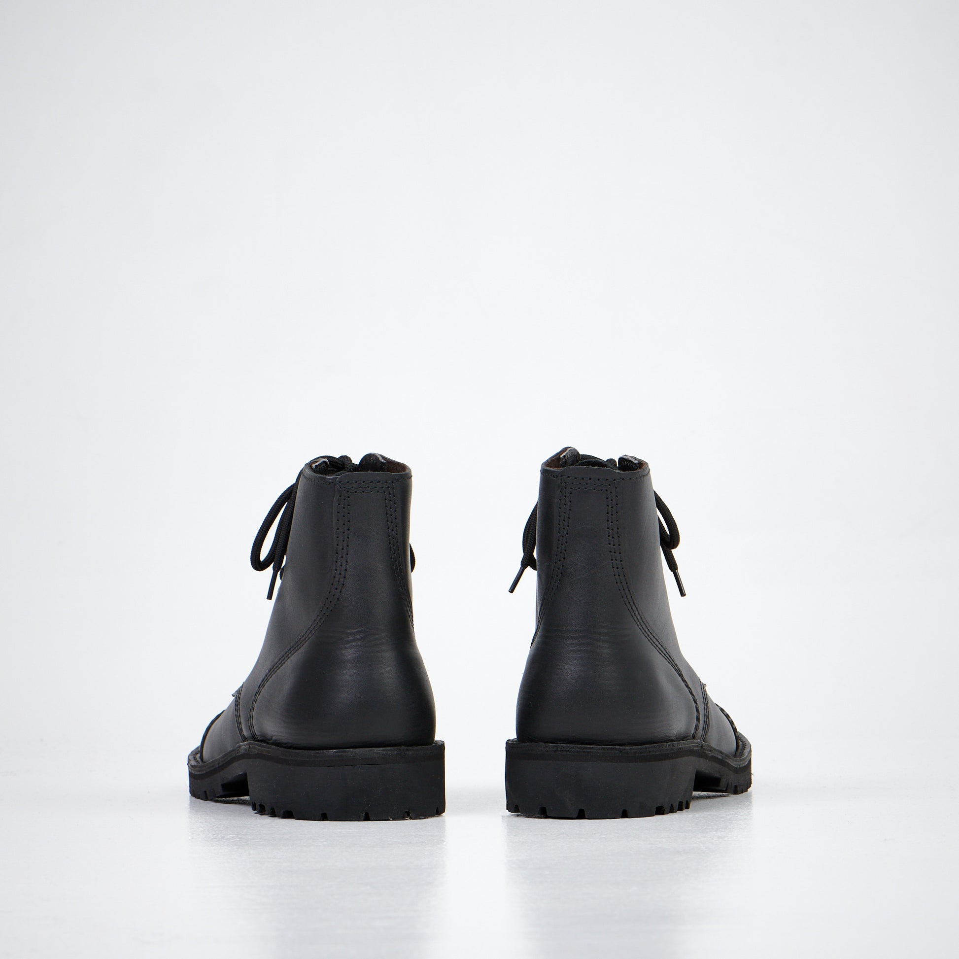Black leather ankle boots with lace-up design, available in sizes 40, 41, and 42 by AIPI.