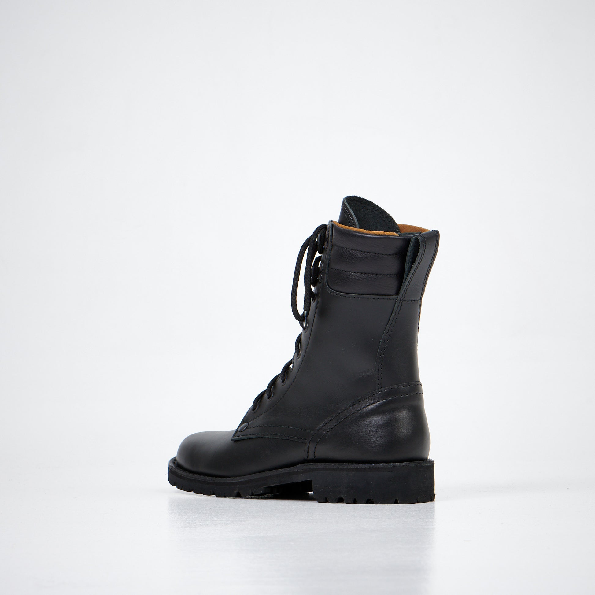 Black leather ankle boots with lace-up front and rugged sole, available in sizes 40, 41, and 45 by aipi.