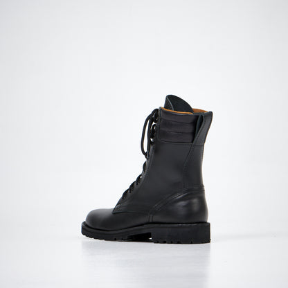 Black leather ankle boots with lace-up front and rugged sole, available in sizes 40, 41, and 45 by aipi.