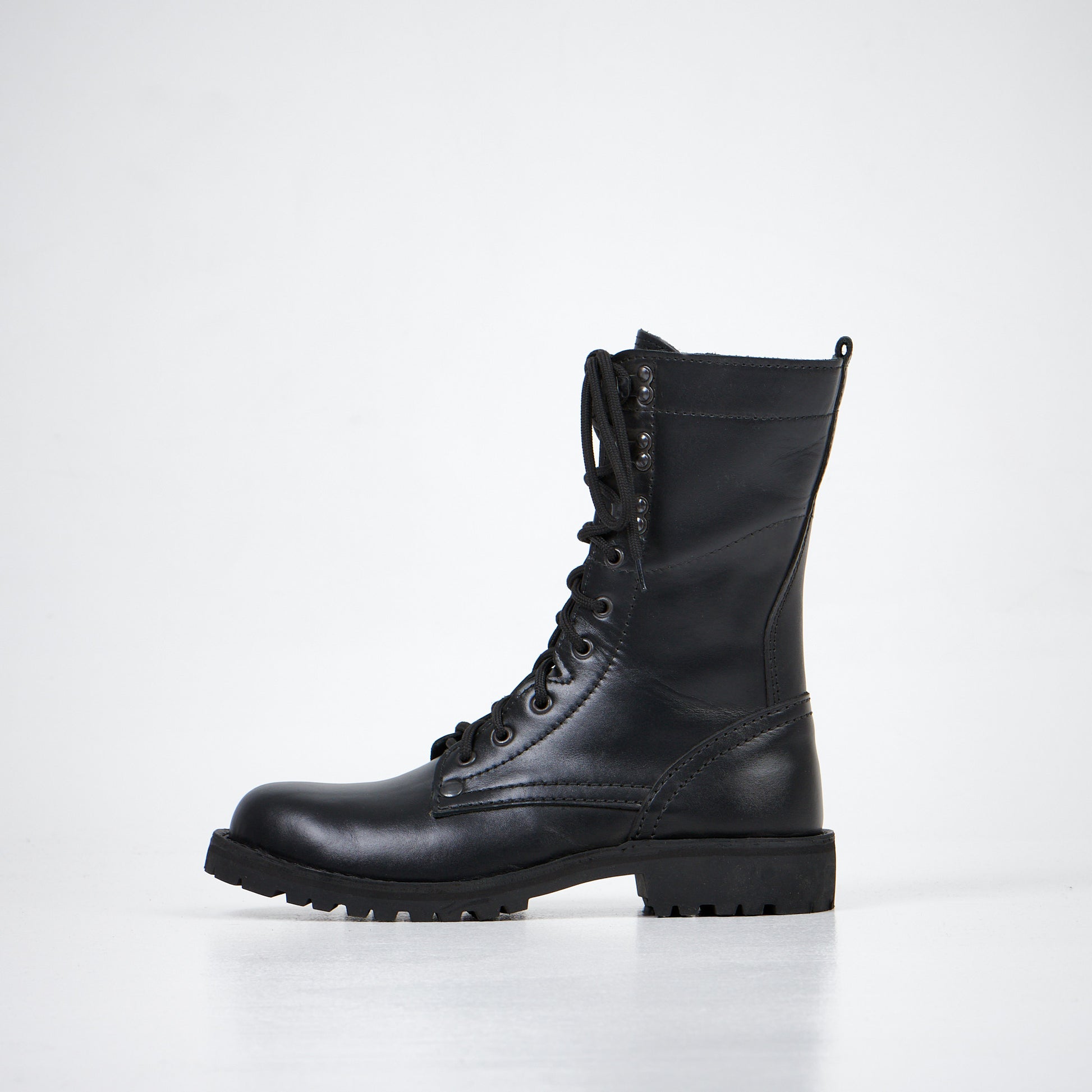 Black leather combat boots with lace-up front and rugged sole, AIPI-2 model by aipi.