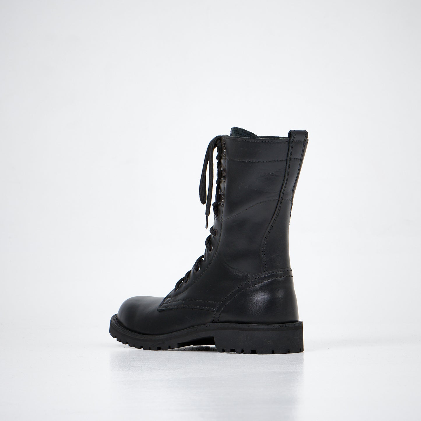 Black leather lace-up combat boots with a rugged sole, brand AIPI, available in sizes 38, 40, and 52.