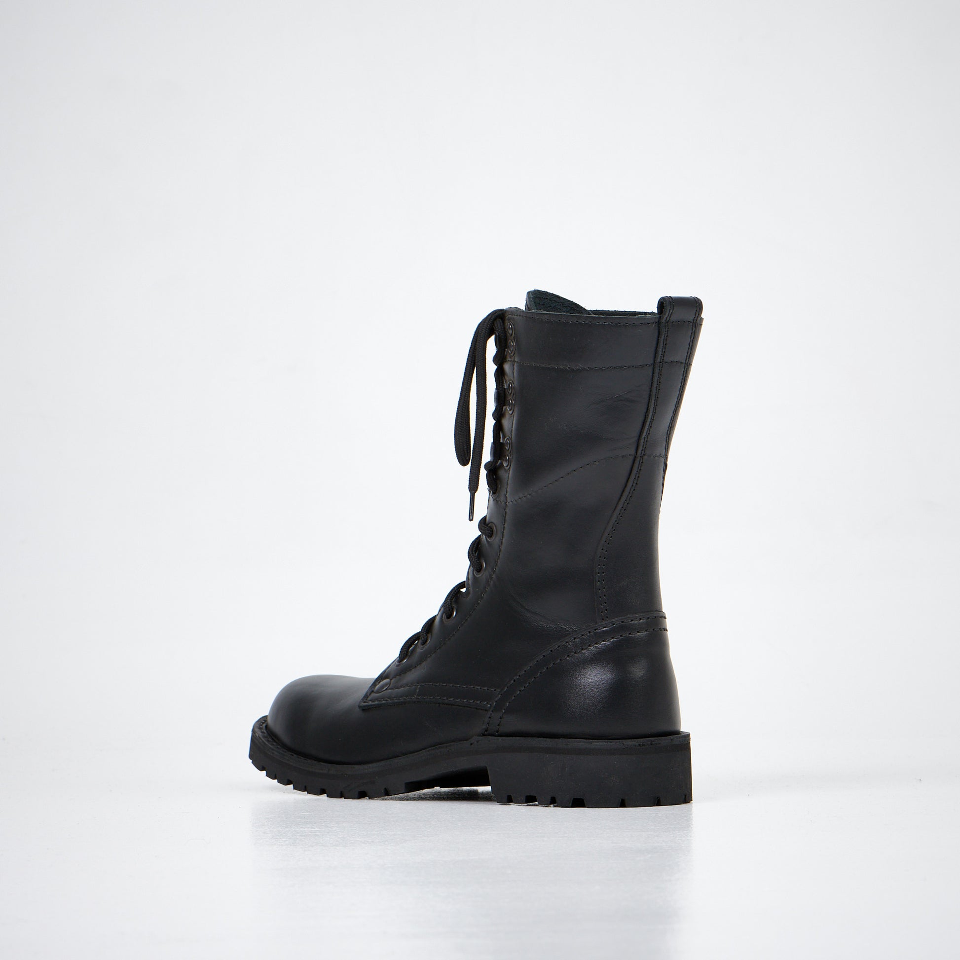 Black leather lace-up combat boots with a rugged sole, brand AIPI, available in sizes 38, 40, and 52.