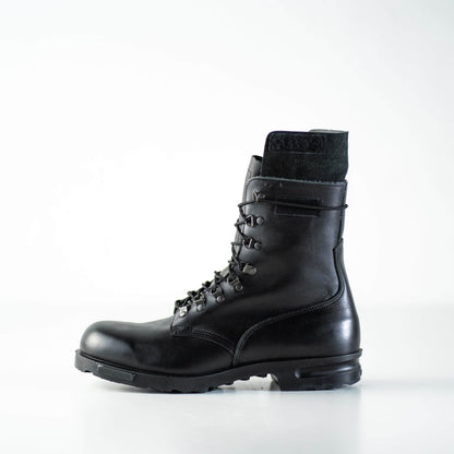 Black full grain leather combat boots by Samelin with anatomical insole and durable PU sole.