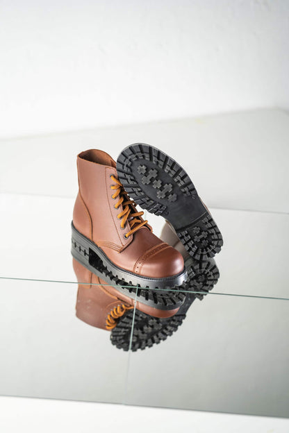 Brown water-repellent leather aviator boots with antibacterial insole, by Samelin, featuring a chunky rubber sole.