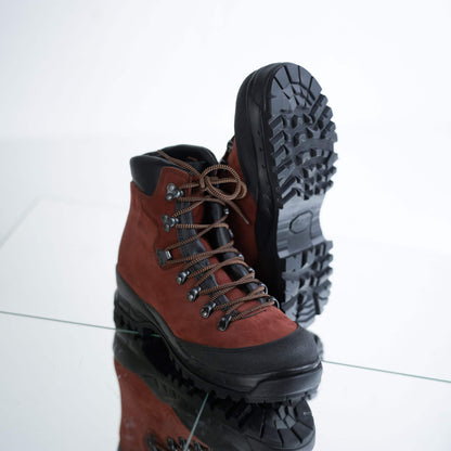 Red waterproof nubuck leather hiking boots with rugged black soles and lace-up design by Samelin.