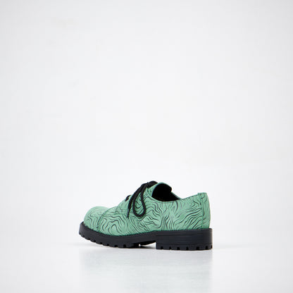 Green zebra-pattern leather boots with lace-up design and durable black PU sole by Samelin