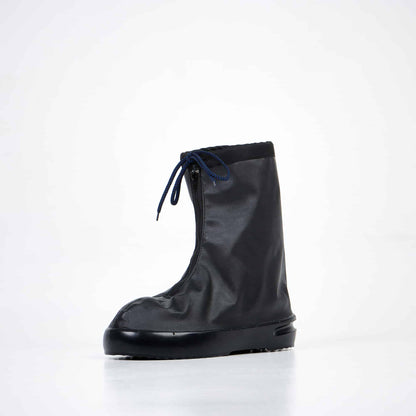 Black waterproof overboots by Samelin, made of polyester with a PU sole, featuring a foldable design and a faux-fur lining.
