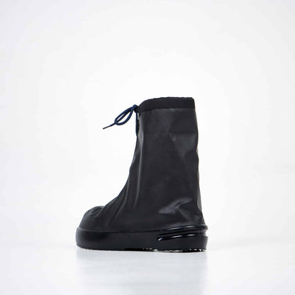 Black waterproof overboots with polyester material and PU sole, featuring an artificial fur lining. Size 39-40.