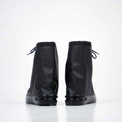 Black polyester waterproof overboots with PU sole, foldable design, artificial fur lining, sizes 37-42 by Samelin.