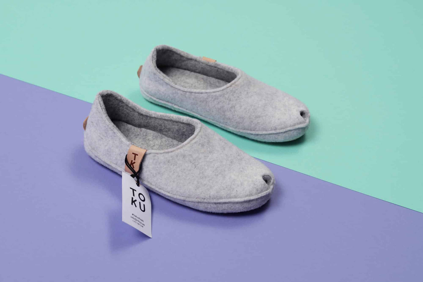 White felt slippers with open toe design, brand tag, available in sizes 36, 37, and 38, by Omaking.