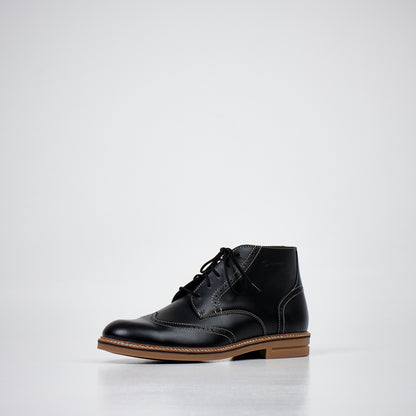 Black leather ankle boots with lace-up closure and contrasting tan sole, available in sizes 39, 40, and 41.