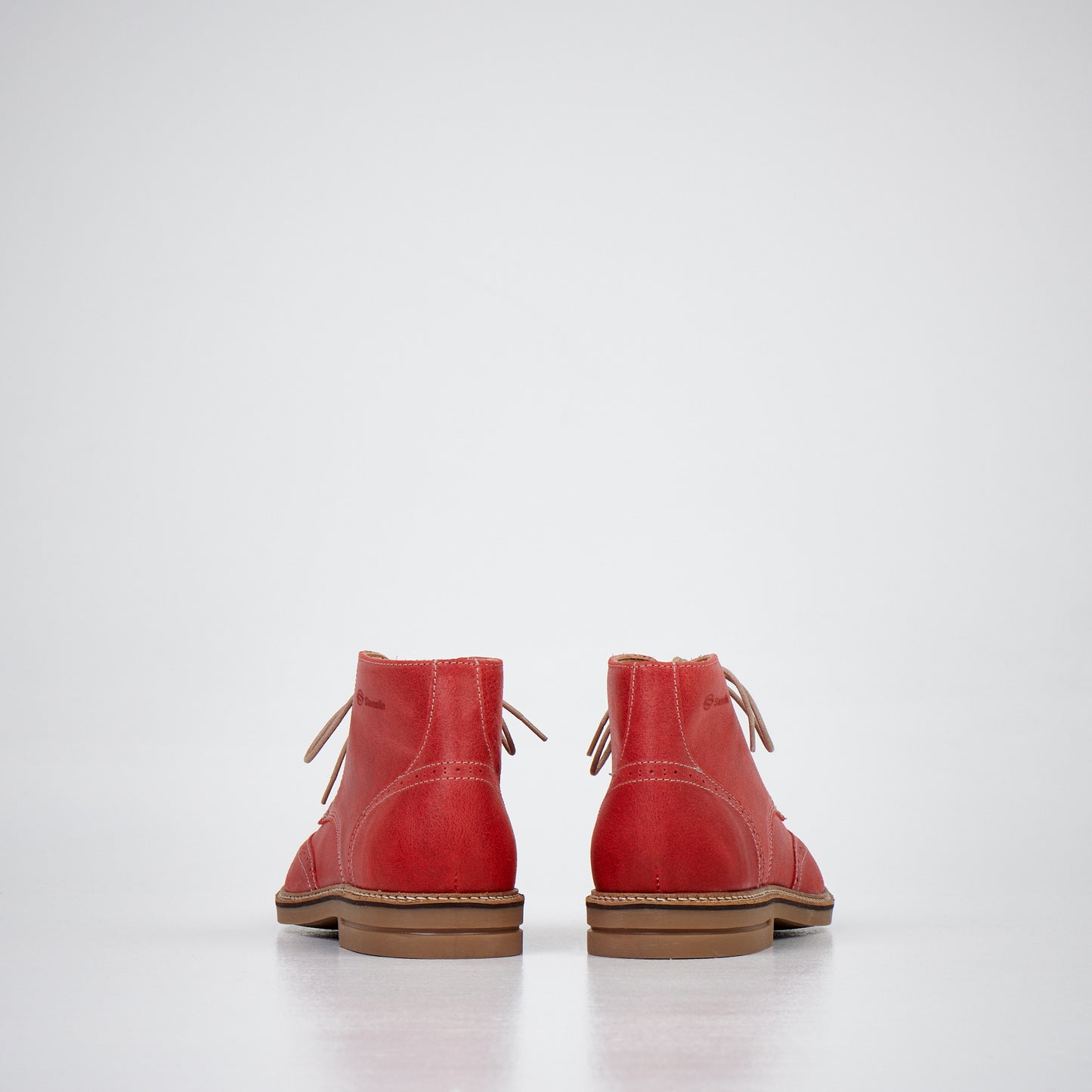 Red ankle boots with laces and a leather finish, brand Samelin, available in sizes 39, 40, and 41.