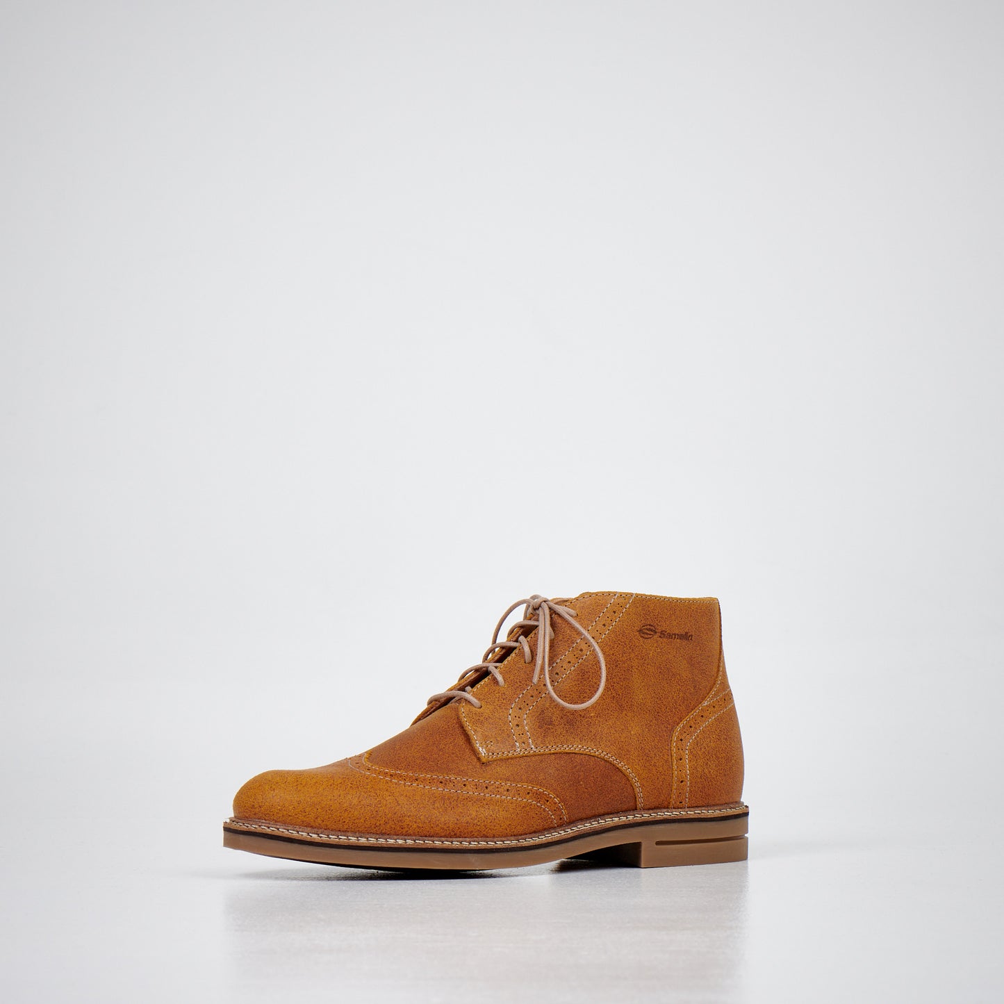 Light brown suede ankle boots with lace-up closure and decorative stitching, by Samelin, available in sizes 39-41.